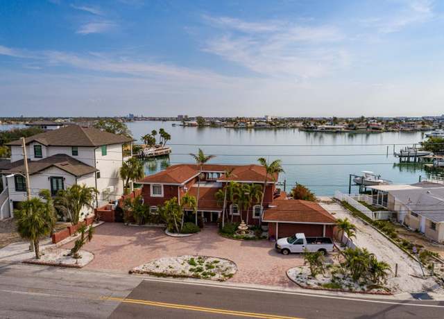 Property at 7013 Boca Ciega Dr, St Pete Beach, FL 33706, 5 beds, 5 baths