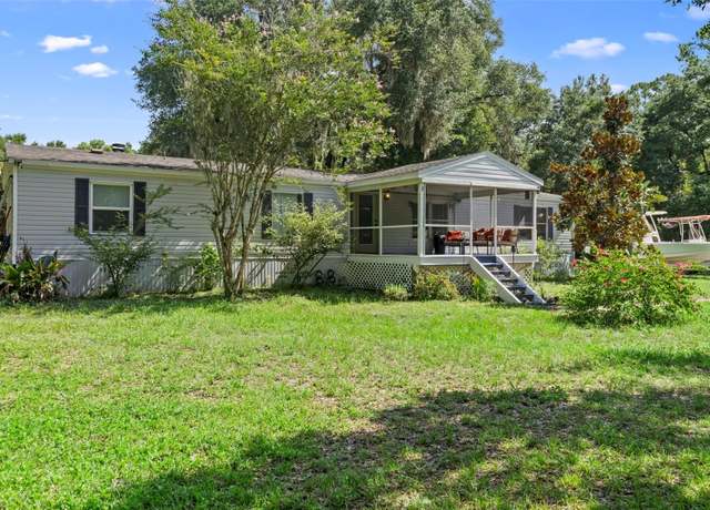 Property at 1910 Mullet Lake Park Rd, Geneva, FL 32732, 4 beds, 2 baths