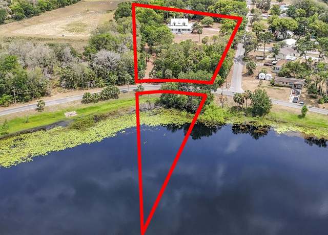 Property at 511 E Mirror Lake Dr, Fruitland Park, FL 34731, 4 beds, 2 baths
