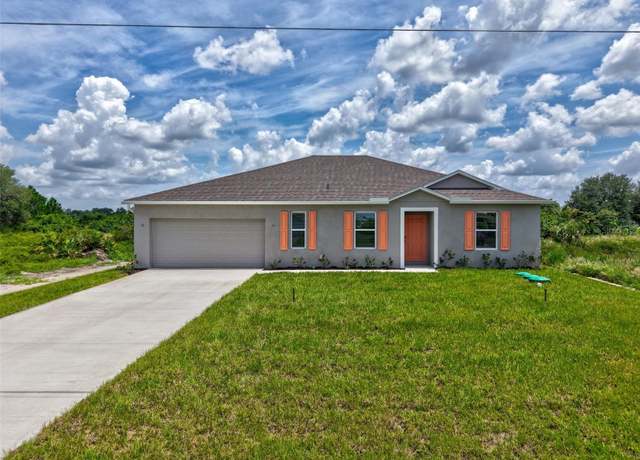 Property at 170 Patio St, Lehigh Acres, FL 33974, 4 beds, 2 baths