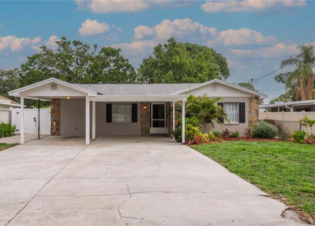 Property at 7503 Winchester Dr, Tampa, FL 33615, 4 beds, 4 baths