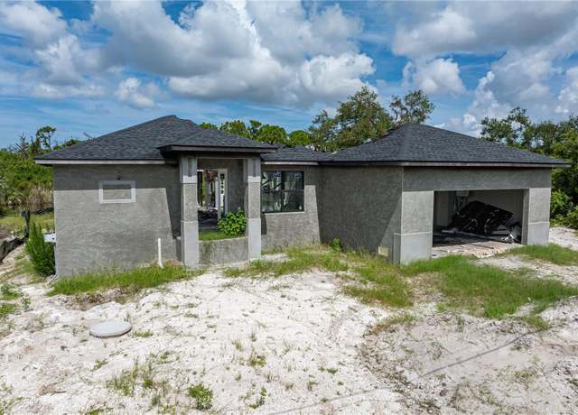 Property at 10303 Redondo St, Port Charlotte, FL 33981, 3 beds, 2.5 baths