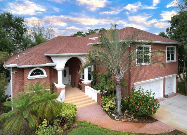 Property at 1218 Castle Ter, Tarpon Springs, FL 34689, 5 beds, 3 baths