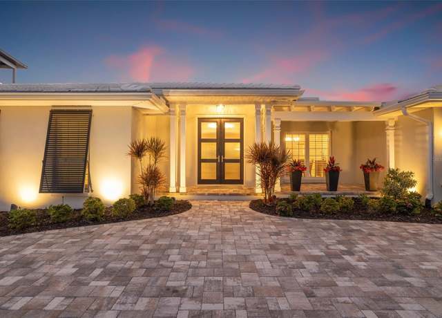 Property at 935 Eden Isle Dr NE, St Petersburg, FL 33704, 5 beds, 3.5 baths