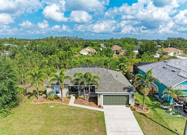 Property at 9211 Koma St, Port Charlotte, FL 33981, 3 beds, 2 baths