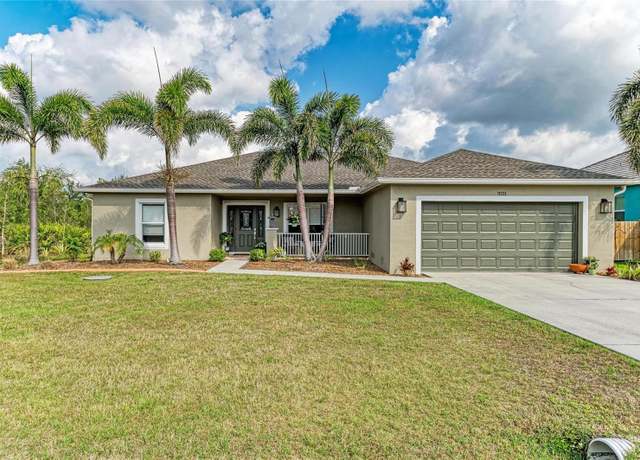 Property at 9211 Koma St, Port Charlotte, FL 33981, 3 beds, 2 baths