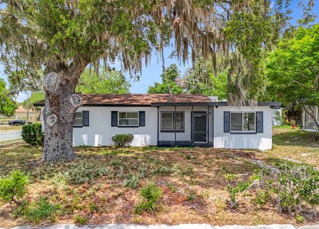 Property at 1000 E Dixie Ave, Leesburg, FL 34748, 4 beds, 2 baths