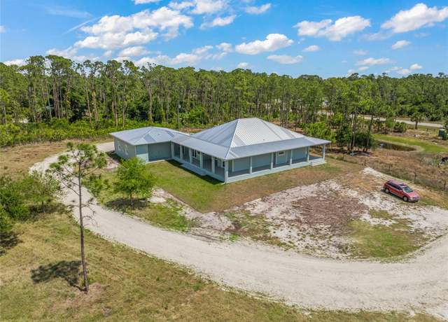 Property at 8146 Tropicaire Blvd, North Port, FL 34291, 3 beds, 3.5 baths