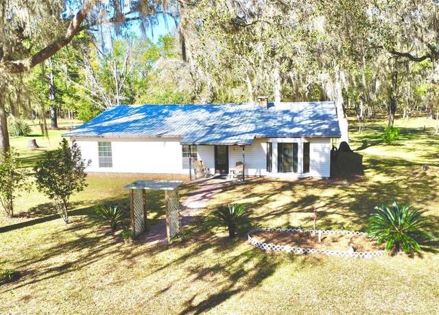 Property at 4220 NW 235th Ave, Alachua, FL 32615, 4 beds, 2 baths