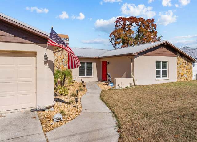 Property at 11001 Hobson St, Spring Hill, FL 34608, 3 beds, 2 baths