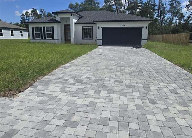 Property at 614 Marion Oaks Blvd, Ocala, FL 34473, 4 beds, 2 baths