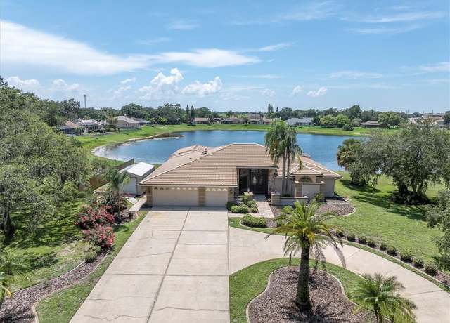 Property at 8827 Scout Lake Ct, New Port Richey, FL 34654, 4 beds, 2 baths