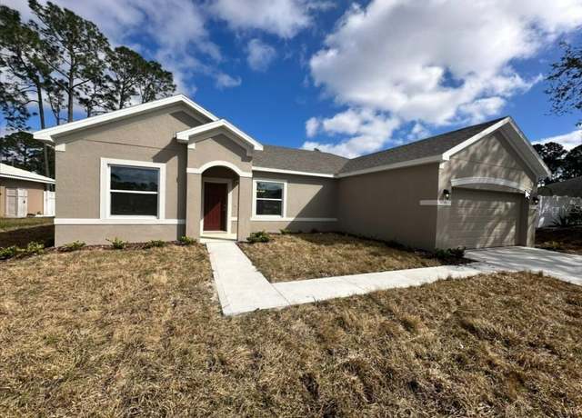 Property at 59 Woodhollow Ln, Palm Coast, FL 32164, 3 beds, 2 baths