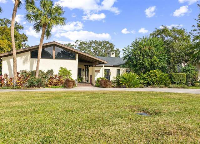 Property at 1212 Lake Point Dr, Lakeland, FL 33813, 5 beds, 3.5 baths