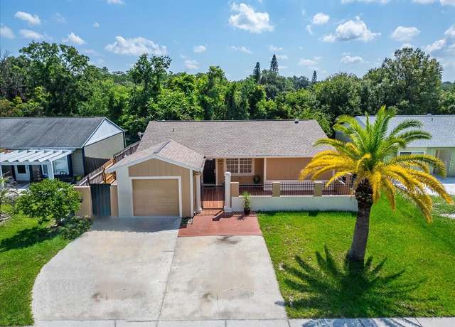 Property at 5731 Ridgestone Dr, Tampa, FL 33625, 3 beds, 2 baths