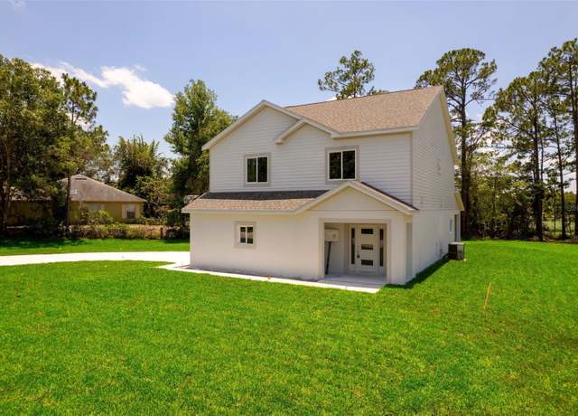 Property at 300 Mitnik Dr, Deltona, FL 32738, 4 beds, 2.5 baths