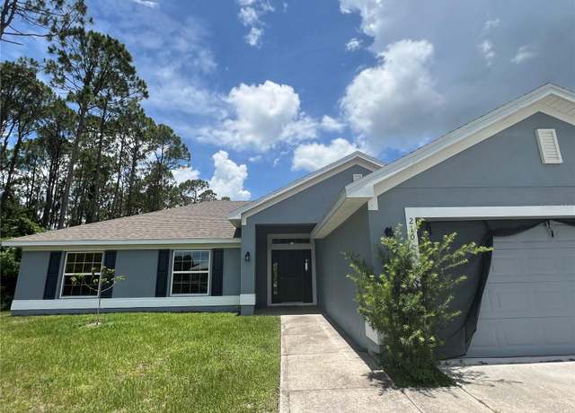 Property at 210 NW Krassner Dr, Palm Bay, FL 32907, 4 beds, 2 baths