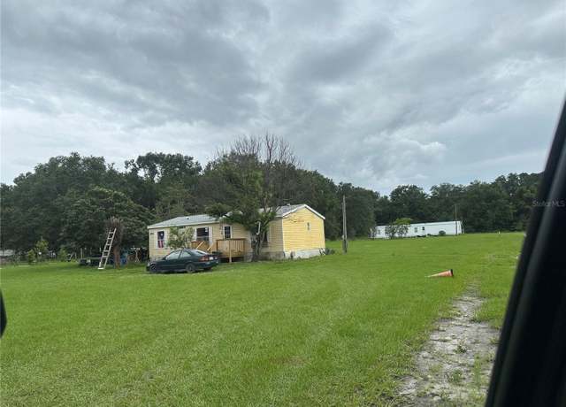 Property at 7041 23rd St, Zephyrhills, FL 33540, 3 beds, 2 baths