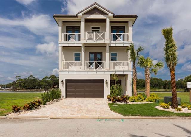 Property at 240 Yacht Harbor Dr, Palm Coast, FL 32137, 4 beds, 5 baths