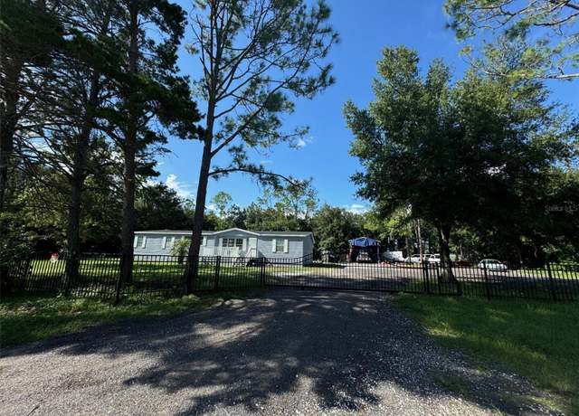 Property at 30313 Chapel Dr, Wesley Chapel, FL 33545, 4 beds, 2 baths