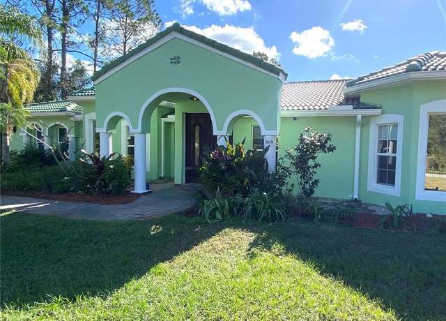 Property at 27752 Ravens Brook Rd, Wesley Chapel, FL 33544, 4 beds, 3 baths