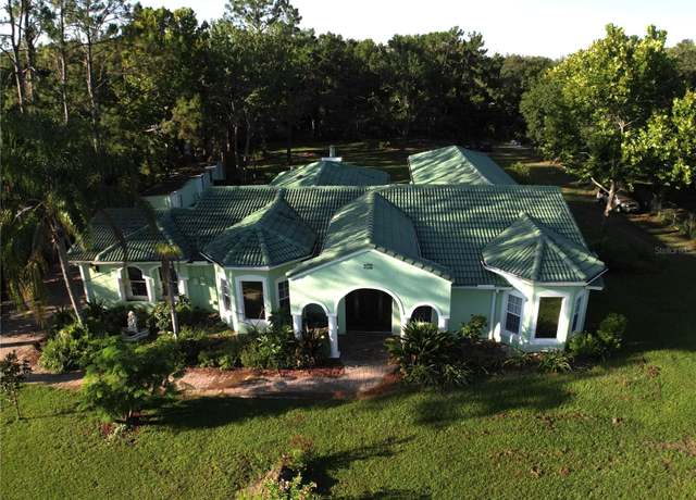 Property at 27752 Ravens Brook Rd, Wesley Chapel, FL 33544, 4 beds, 3 baths
