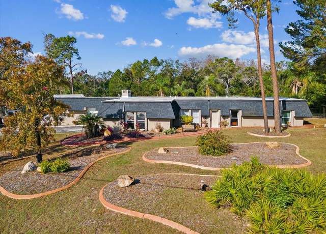 Property at 7815 Tanglewood Dr, New Port Richey, FL 34654, 5 beds, 4 baths