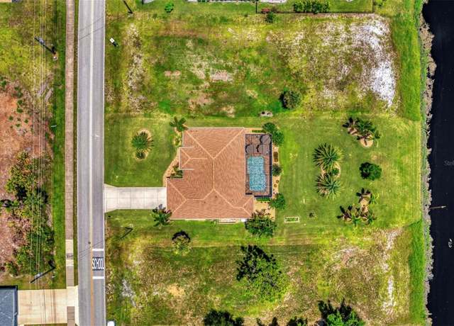 Property at 448 Boundary Blvd, Rotonda West, FL 33947, 3 beds, 3 baths