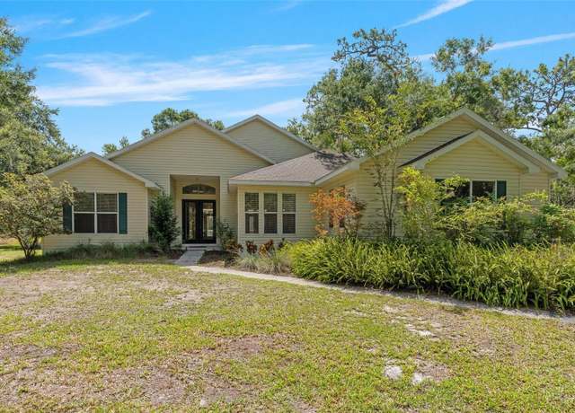 Property at 11933 Pasco Trails Blvd, Spring Hill, FL 34610, 4 beds, 2.5 baths