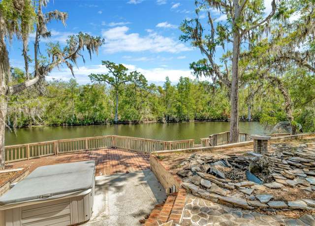 Property at 1401 N Riverhills Dr, Temple Terrace, FL 33617, 5 beds, 5.5 baths