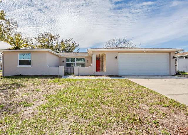 Property at 9811 Rainbow Ln, Port Richey, FL 34668, 4 beds, 2 baths