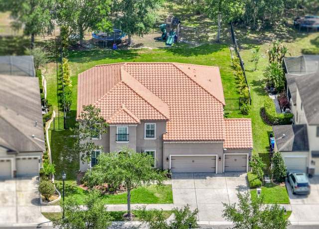 Property at 7927 Hampton Lake Dr, Tampa, FL 33647, 4 beds, 3 baths