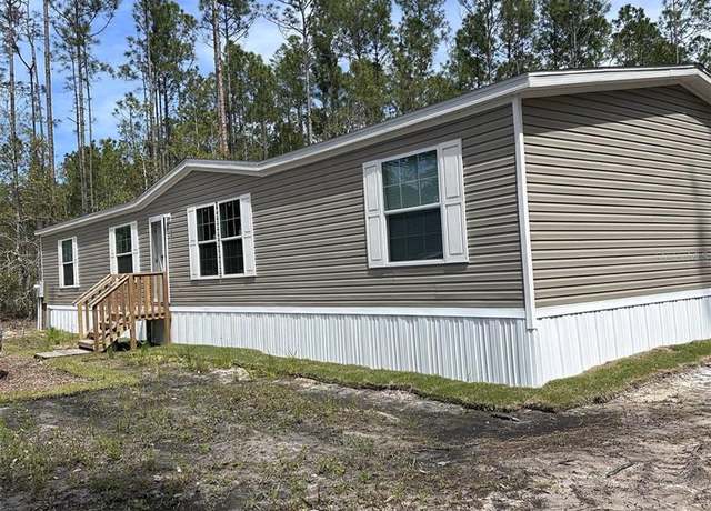 Property at 1391 Beech Blvd, Bunnell, FL 32110, 4 beds, 2 baths