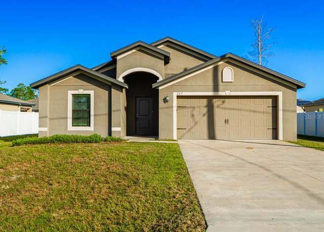 Property at 207 Goldenrod Ln, Kissimmee, FL 34759, 4 beds, 2 baths