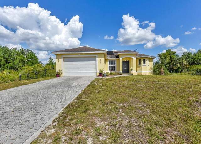 Property at 1616 Moore Ave, Lehigh Acres, FL 33972, 4 beds, 3 baths