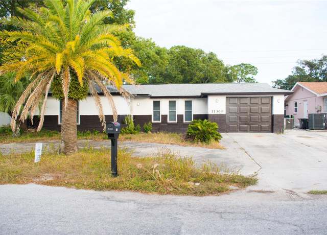 Property at 11300 Yellowwood Ln, Port Richey, FL 34668, 3 beds, 2 baths