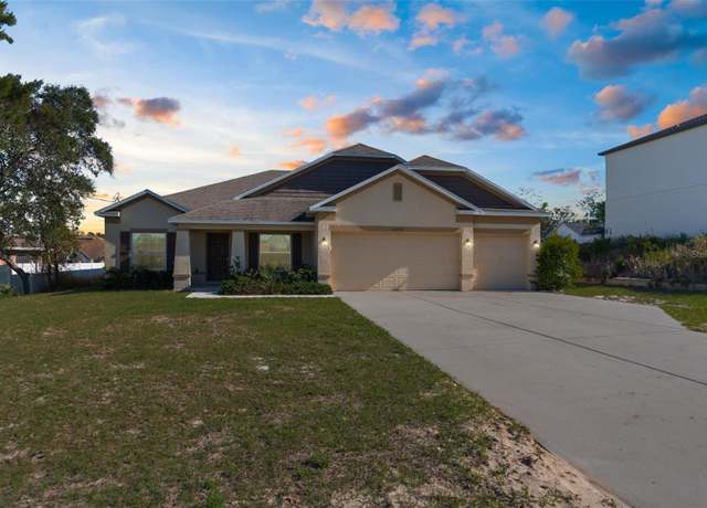 Property at 12450 Fish Cove Dr, Spring Hill, FL 34609, 4 beds, 3 baths