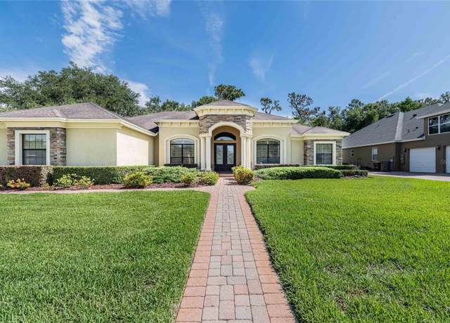 Property at 6658 Crescent Woods Cir, Lakeland, FL 33813, 4 beds, 3 baths