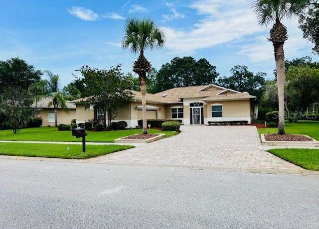Property at 32 Cedar Point Dr, Palm Coast, FL 32164, 3 beds, 2 baths