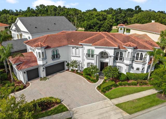 Property at 7459 Gathering Dr, Reunion, FL 34747, 5 beds, 6.5 baths