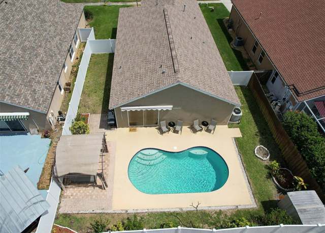 Property at 1666 Meadow Oak Ln, Tarpon Springs, FL 34689, 3 beds, 2 baths