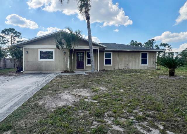 Property at 605 Leo Ave N, Lehigh Acres, FL 33971, 5 beds, 2 baths