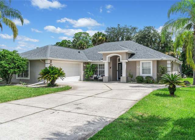 Property at 32 Covington Ln, Palm Coast, FL 32137, 4 beds, 3 baths