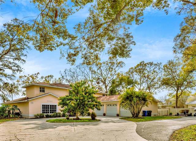 Property at 7201 Hodgewood Ct, Tampa, FL 33614, 5 beds, 3 baths