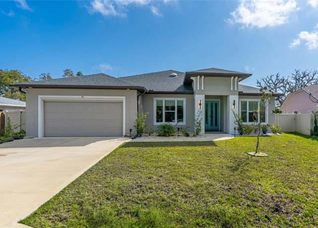 Property at 56 Colechester Ln, Palm Coast, FL 32137, 4 beds, 3 baths
