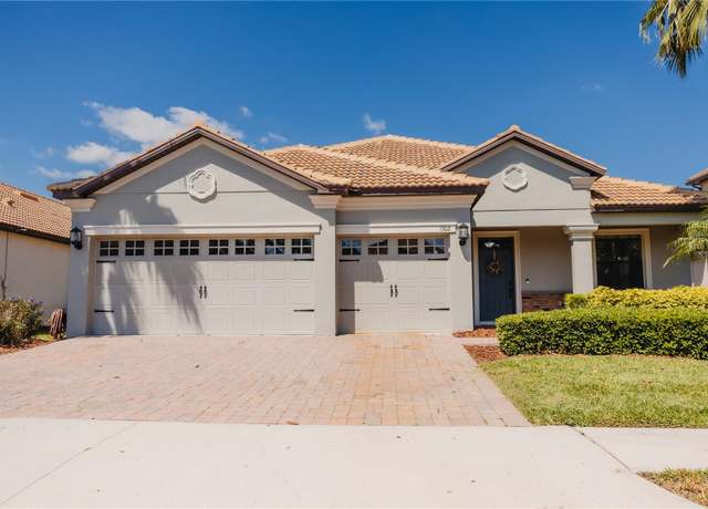 Property at 1302 Moss Creek Ln, Davenport, FL 33896, 4 beds, 3 baths