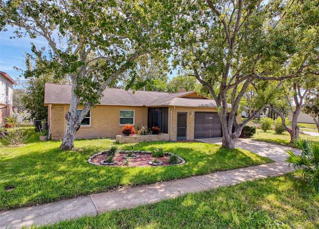 Property at 10824 Peppertree Ln, Port Richey, FL 34668, 3 beds, 2 baths