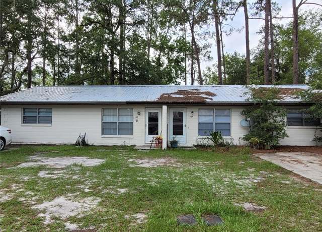 Property at 122 NE 39th Pl, Gainesville, FL 32609, 4 beds, 2 baths