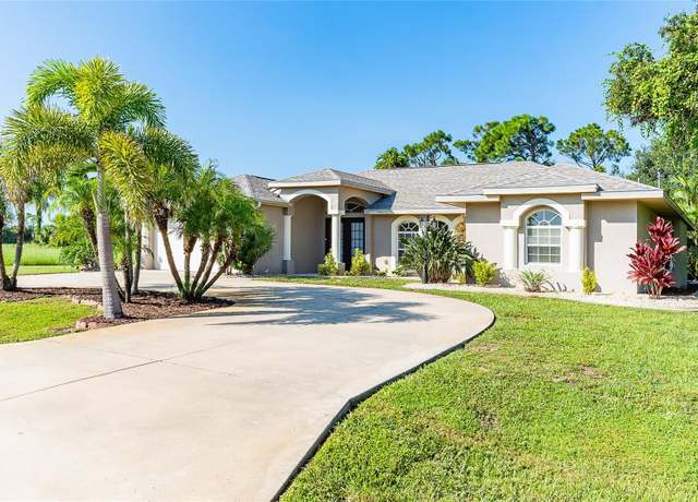 Property at 70 Tournament Rd, Rotonda West, FL 33947, 4 beds, 3 baths