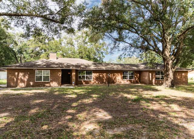 Property at 7129 Oakwind Dr, Orlando, FL 32818, 4 beds, 3 baths